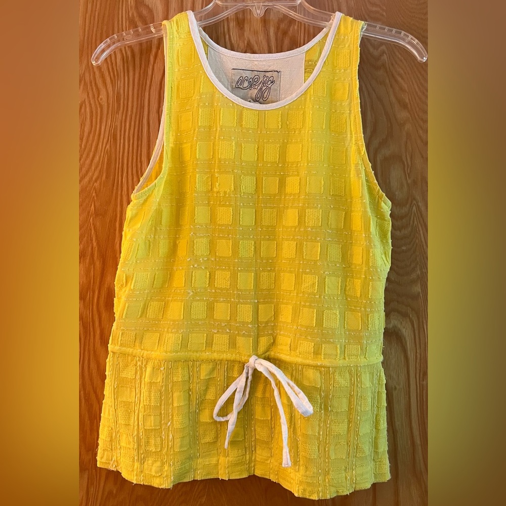 Stunning yellow sleeveless top with tie waist